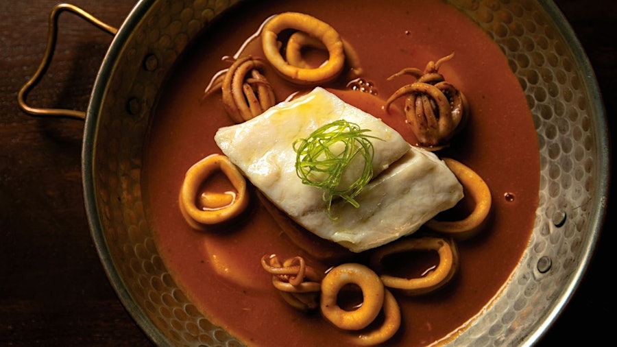 Cataplana is a traditional aromatic seafood stew from Portugal’s Algarve region; Emeril and E.J.’s version puts halibut and squid center stage.